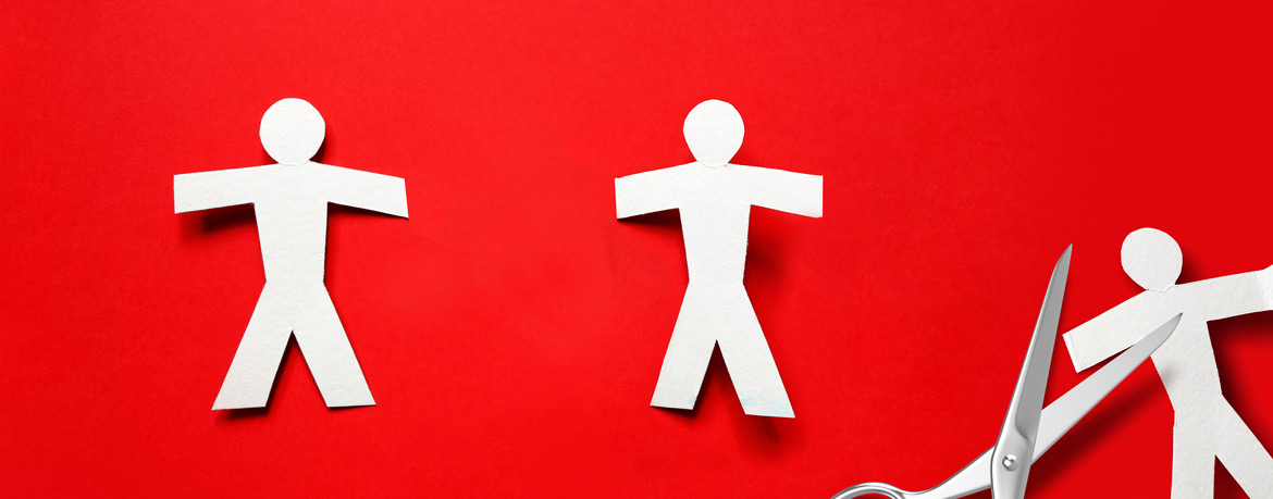 White paper stick figures with scissors on a red background