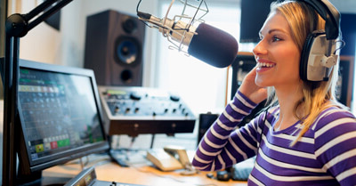 Young woman hosting a radio show